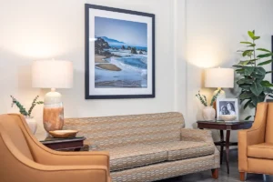 A couch and painting at Oak River