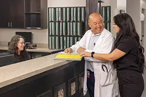 A nurse and doctor working together